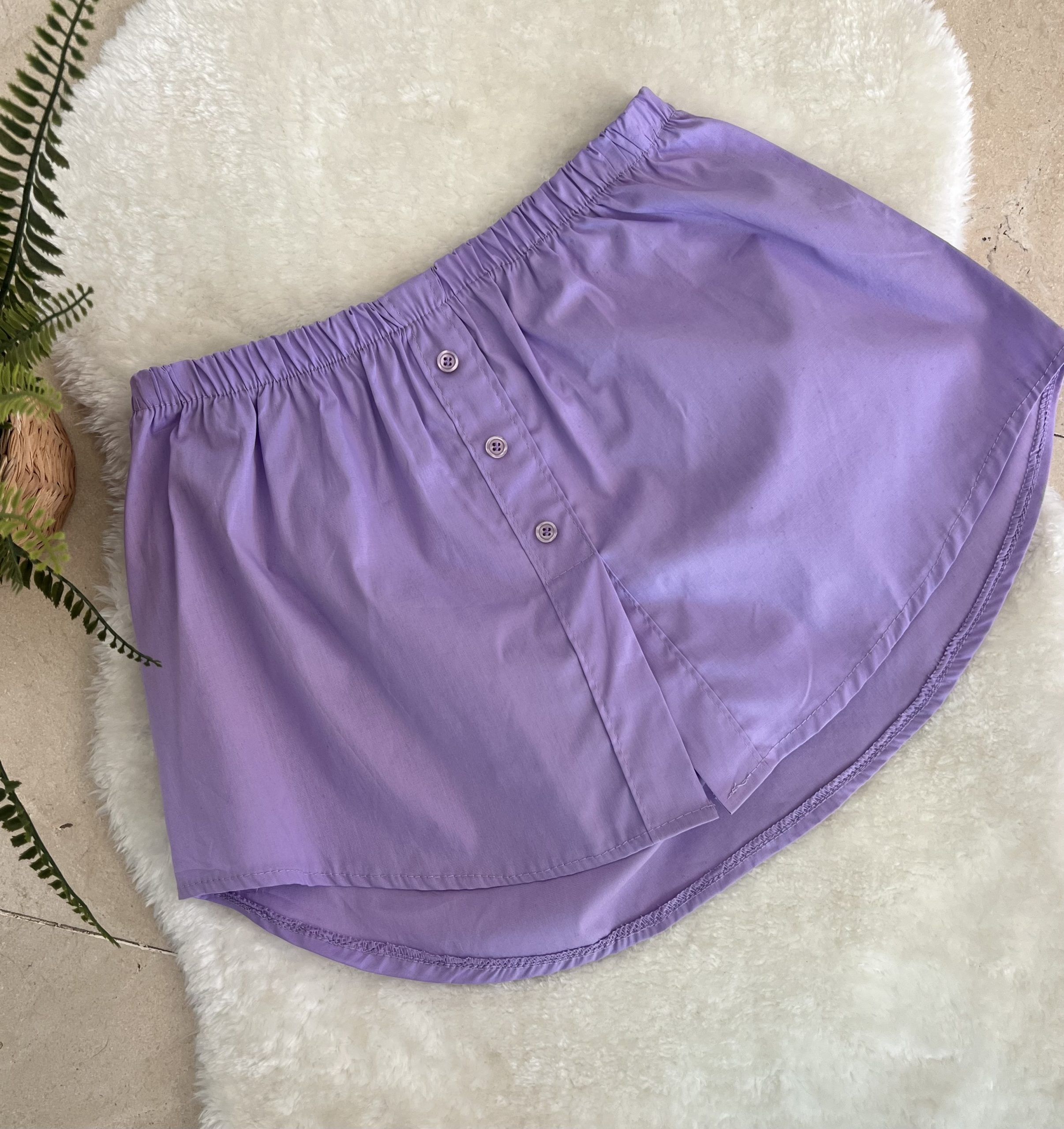 Bajo camisa malva
