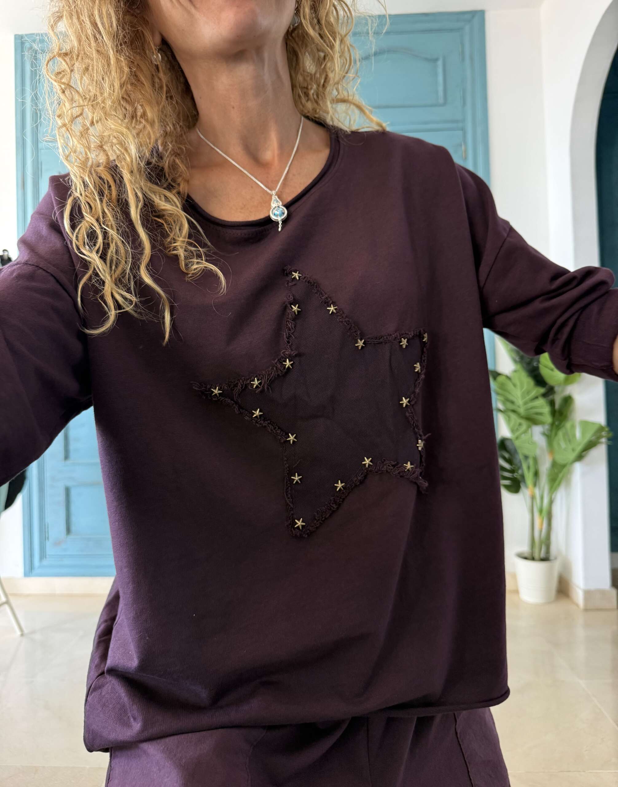 Sudadera estrella púrpura