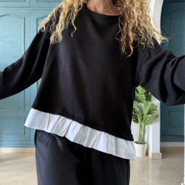 Jersey bajo camisa negro